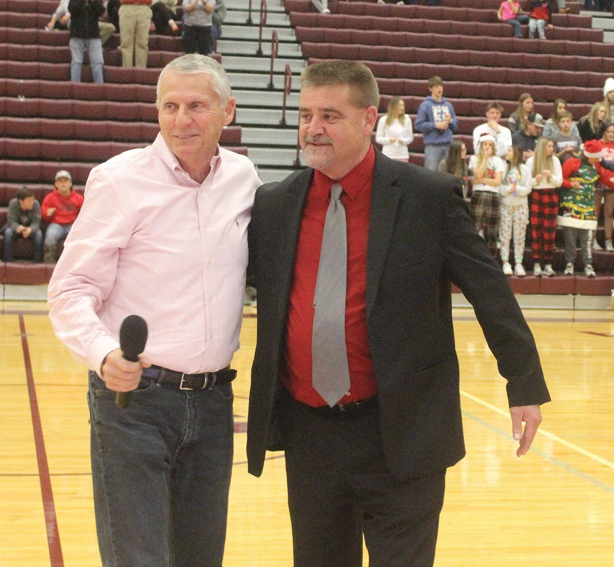 Two Hall of Fame coaches. Brent Colley, left, shared some special remarks before Mountain Grove head coach Duane Hiler was presented a plaque recognizing him for his recent induction into the Missouri Basketball Coaches Hall of Fame.